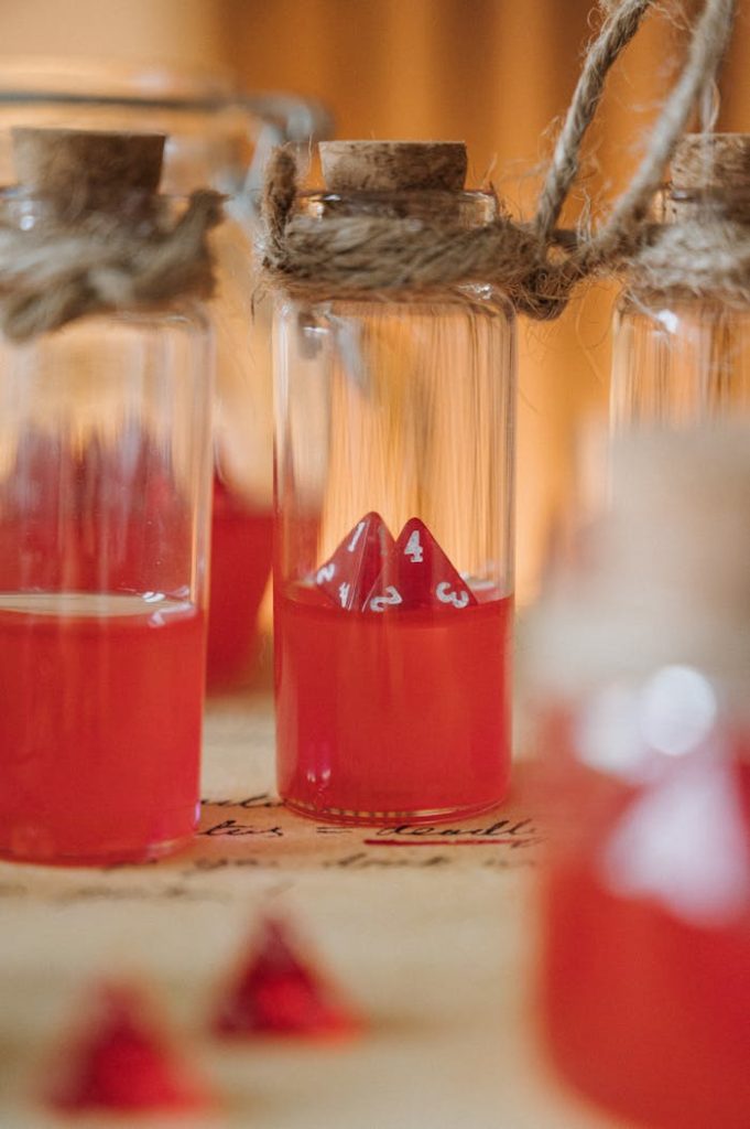 Tied Bottles with Red Liquids